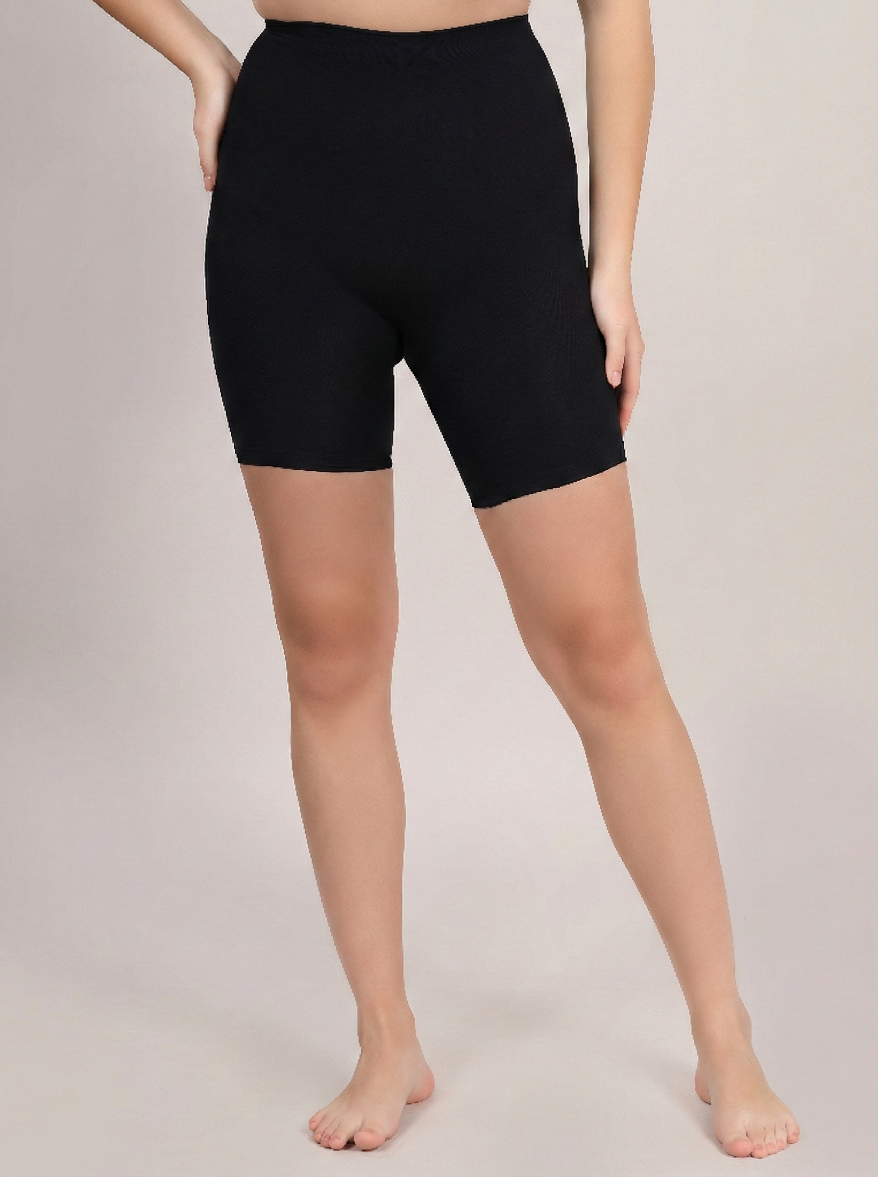 Black butt lifter shapewear shorts showing tummy and hip control