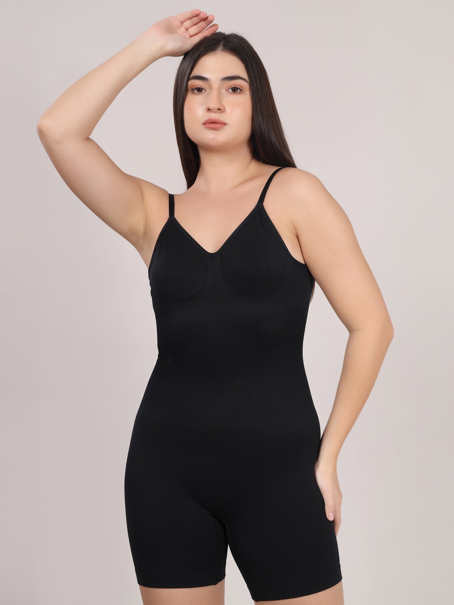 Black open back mid thigh bodysuit shaper front view by Sottura