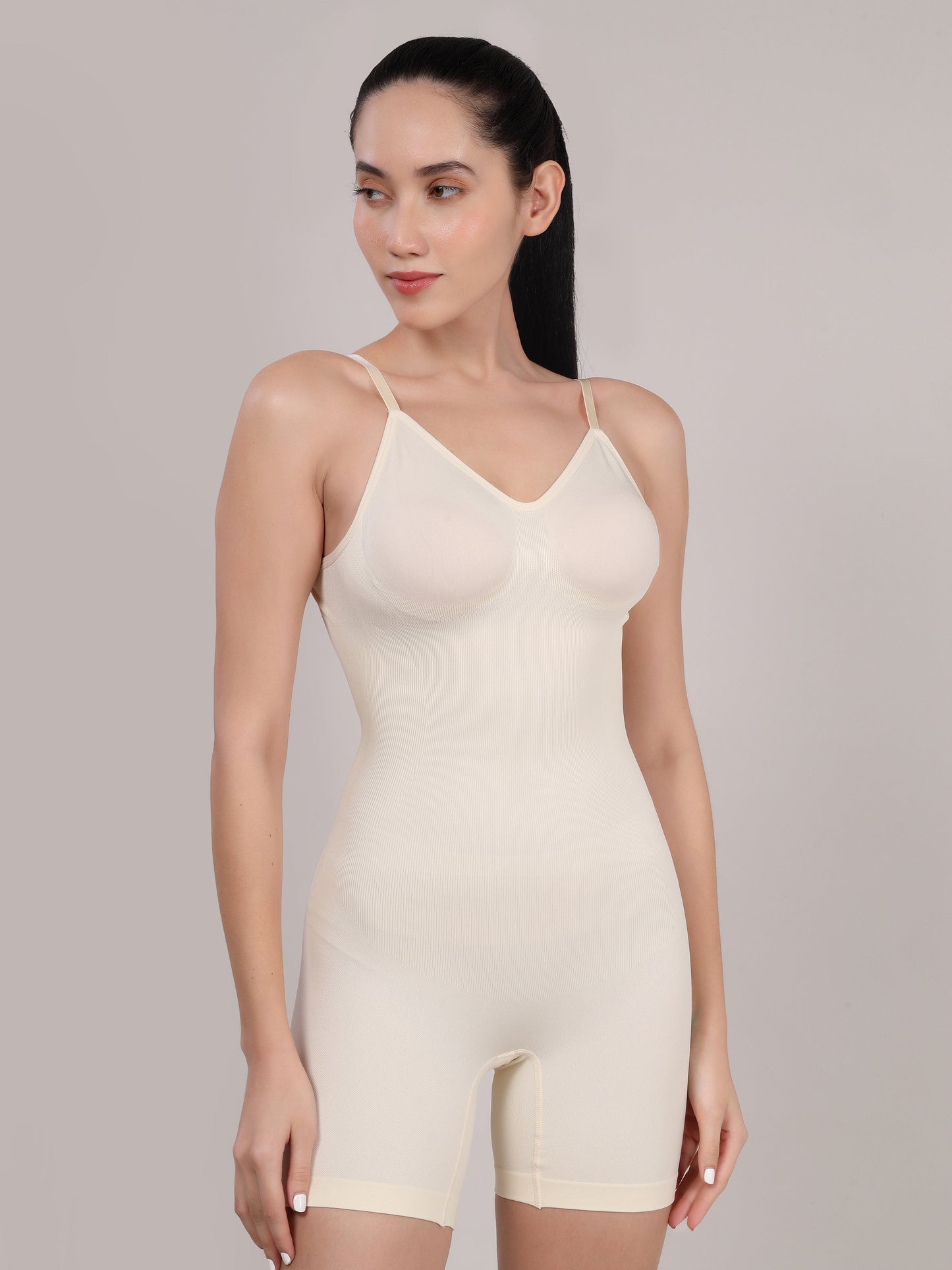 White mid thigh body shaper side view with tummy and thigh control