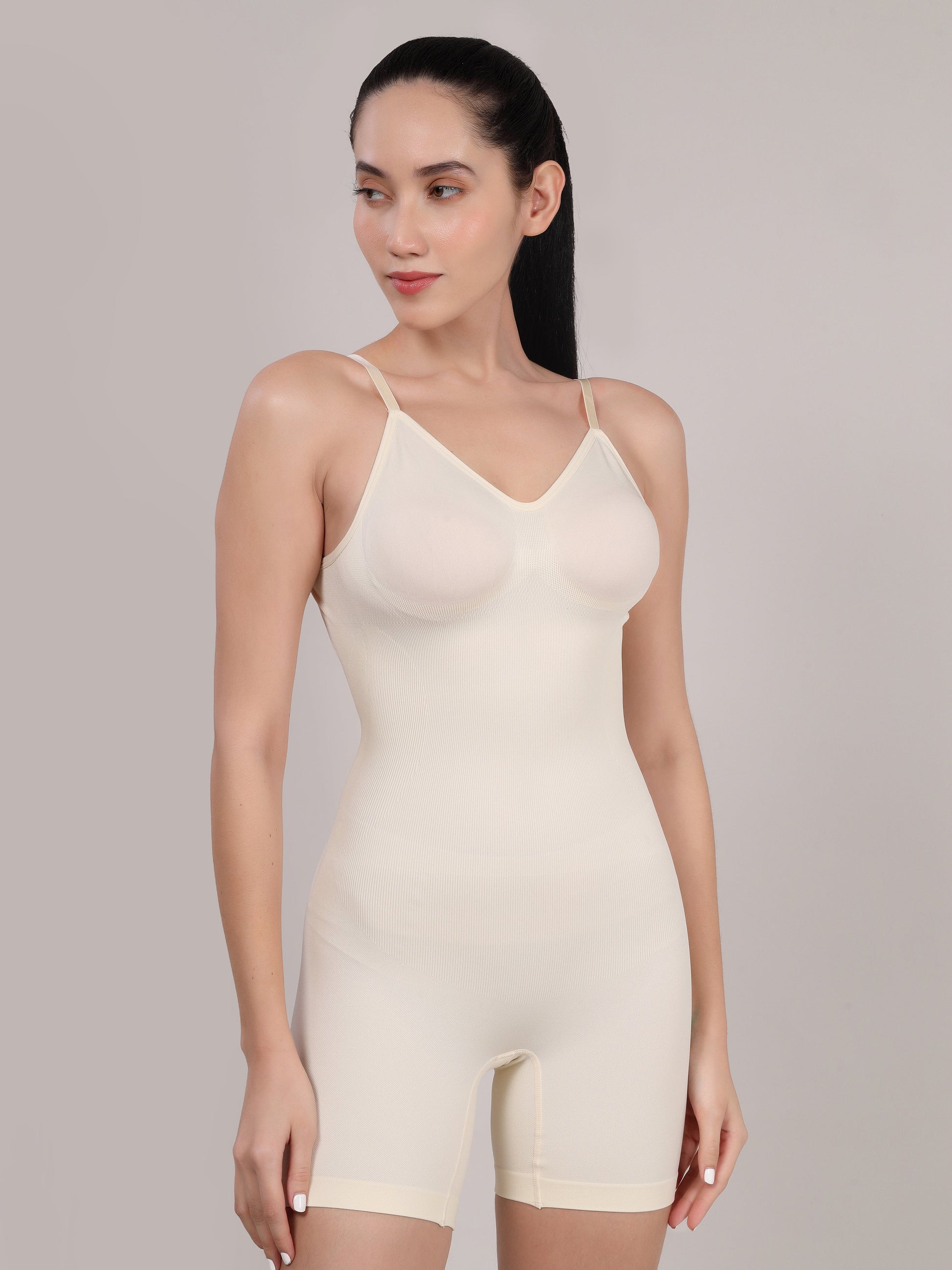 White mid thigh body shaper side view with tummy and thigh control