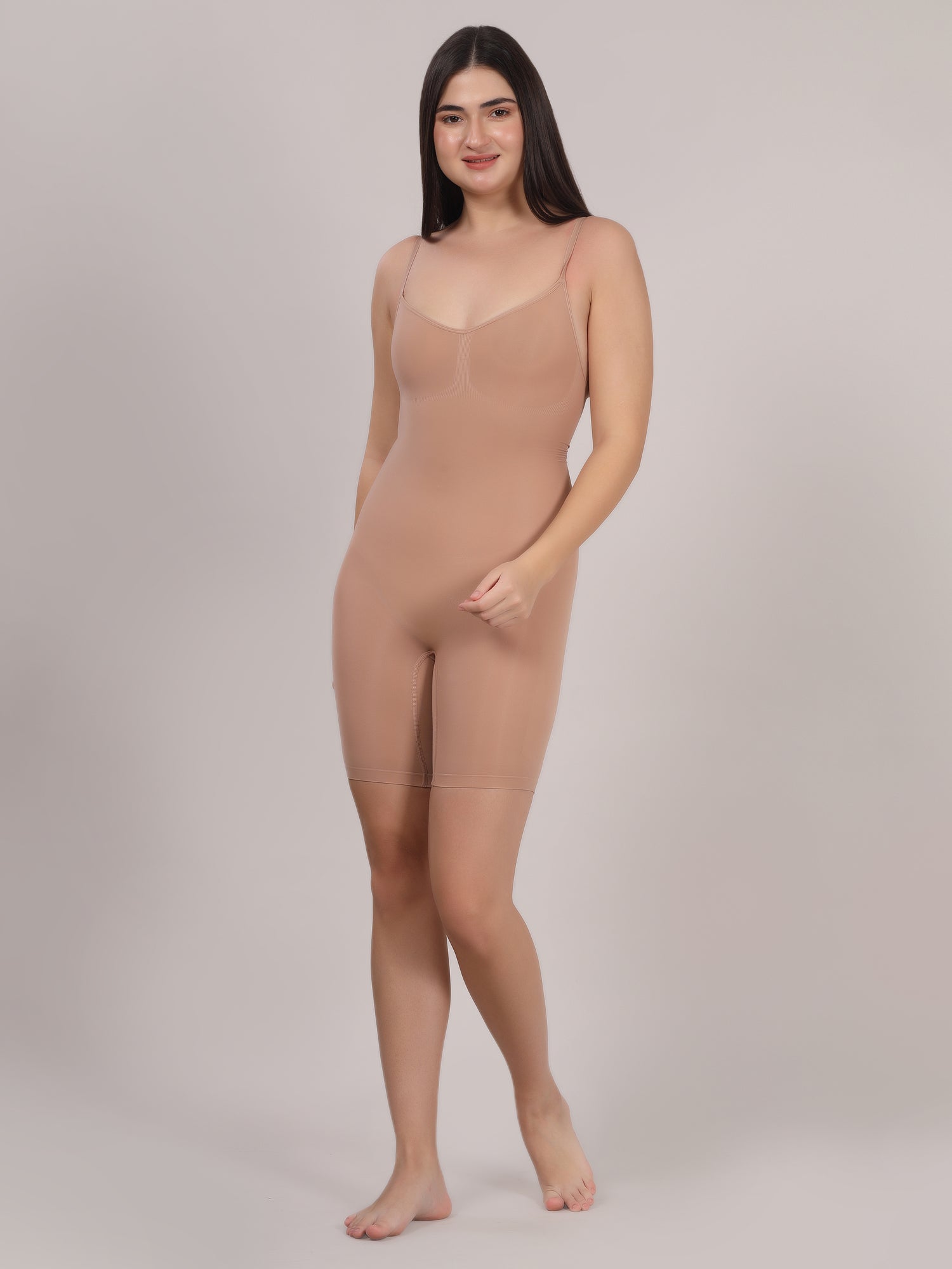 Beige full-body seamless shaping bodysuit front view by Sottura