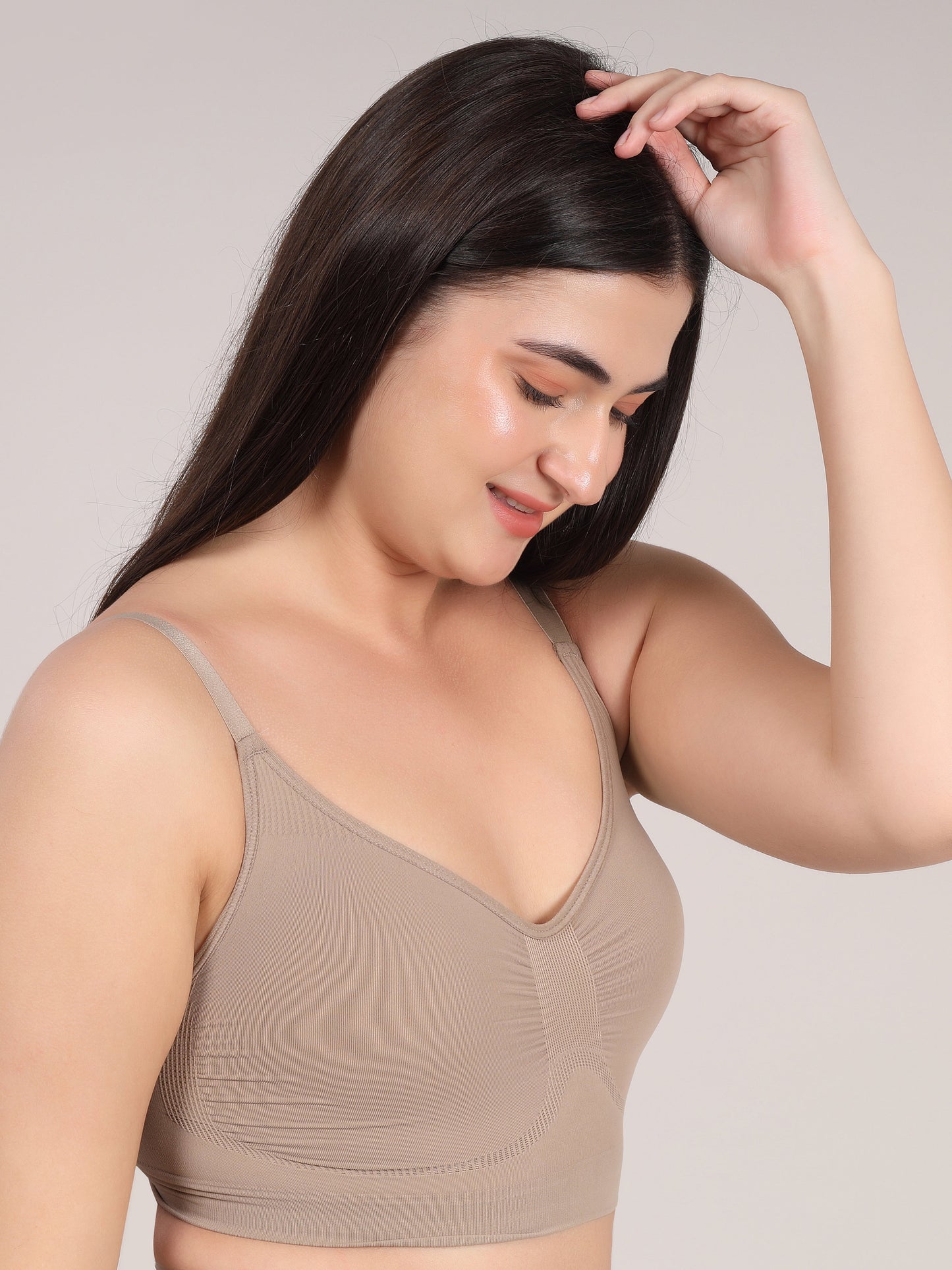 Beige wireless comfort bralette back view showing smooth design