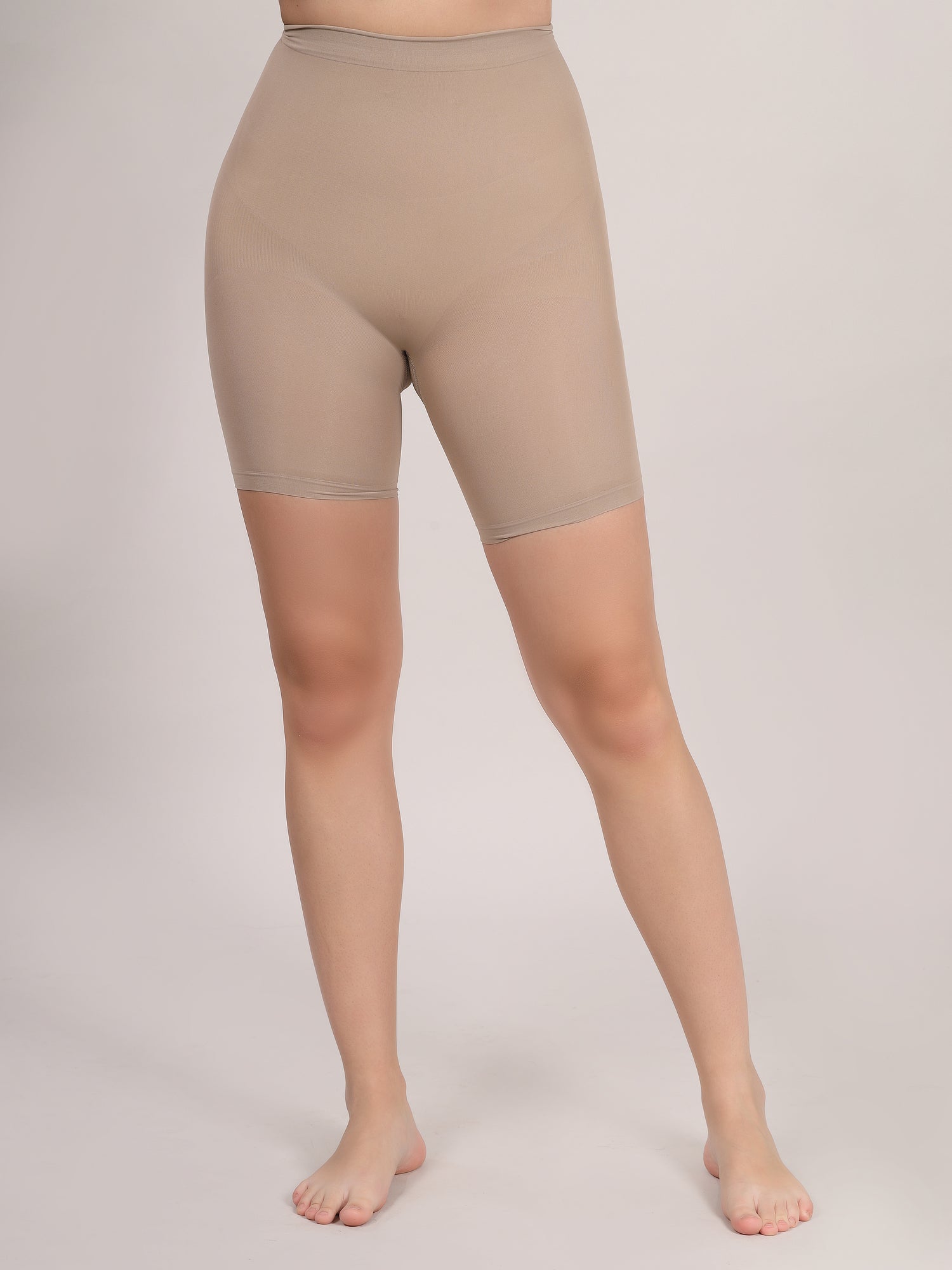 Beige butt lifter shapewear shorts showing tummy and waist control